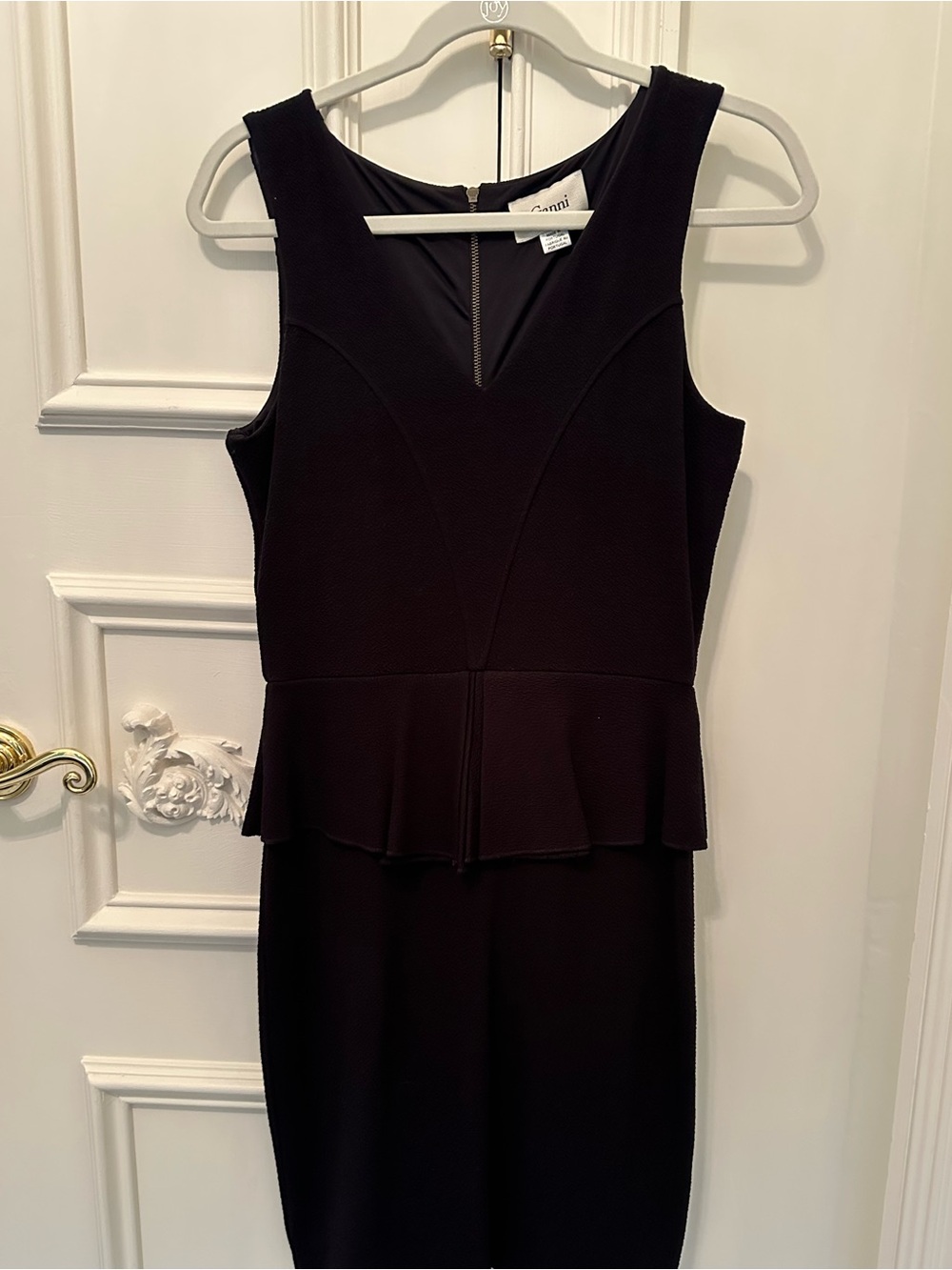 Sleeveless Black Peplum Sheath Dress